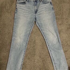 American Eagle Outfitters Tan Leather Patch on Light Blue Denim